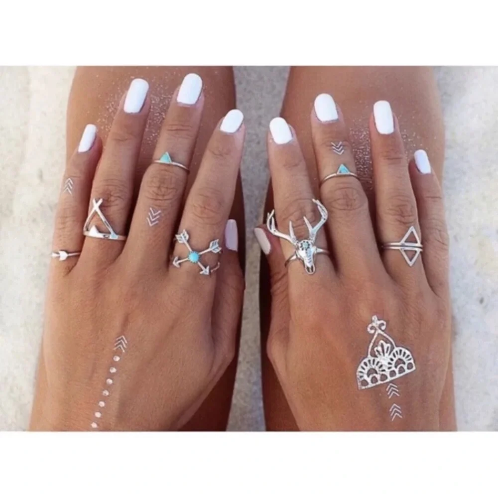 Set of 7 Silver Tone Rings